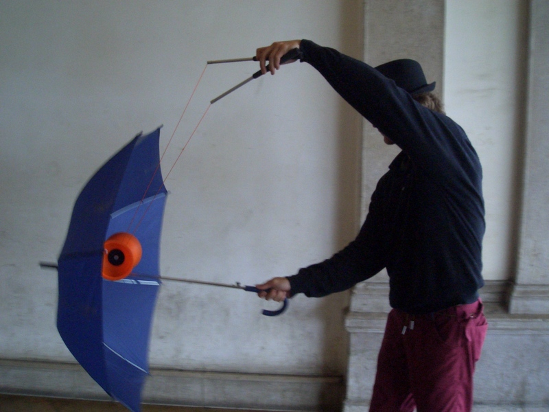 Julien with umbrella at Ljubljana Stn