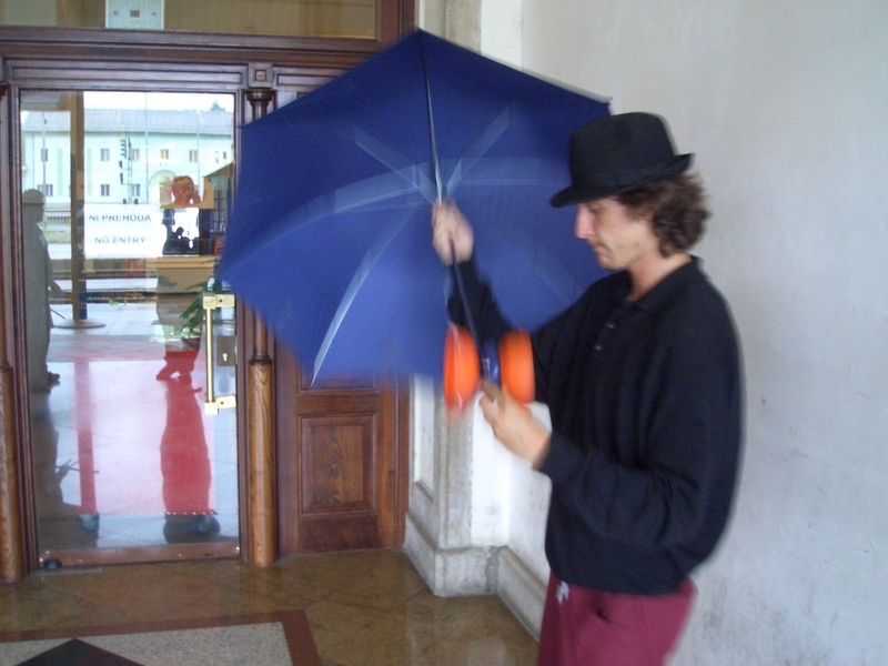 Julien with umbrella at Ljubljana Stn