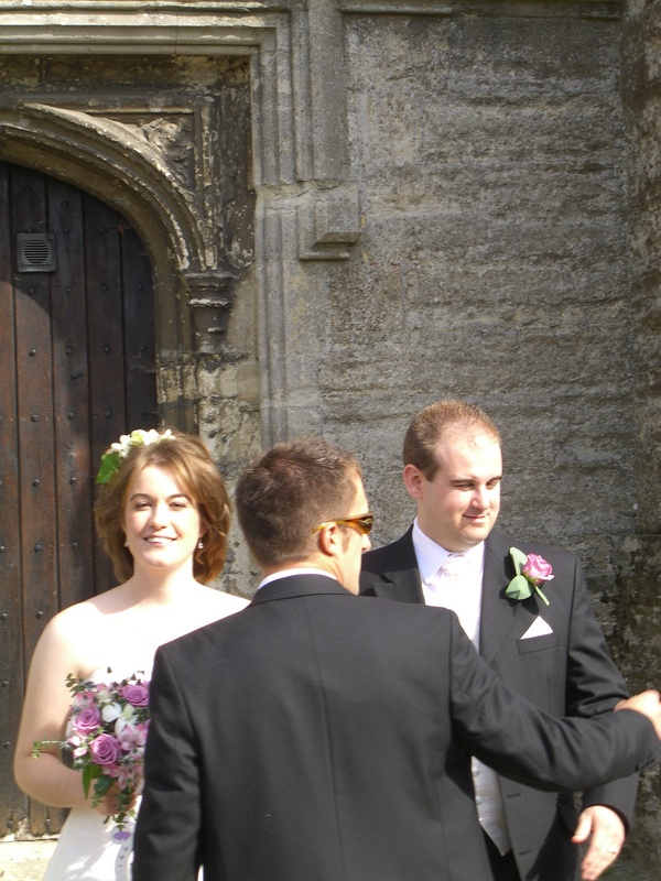 The couple are held back from the confetti by Bryn